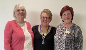 President Sandra welcomes new members Valerie and Terry to the Club